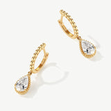 "Echo of Light" Dangling Pear Shaped Lab Grown Diamond Huggie Hoops in 14K Solid Gold (0.74 Ct. Tw. )