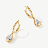 "Echo of Light" Dangling Pear Shaped Lab Grown Diamond Huggie Hoops in 14K Solid Gold (0.74 Ct. Tw. )