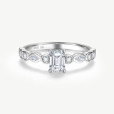 Emerald Cut Lab Grown Diamond Side Stone Engagement Ring in Sterling Silver