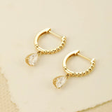 "Echo of Light" Dangling Pear Shaped Lab Grown Diamond Huggie Hoops in 14K Solid Gold (0.74 Ct. Tw. )